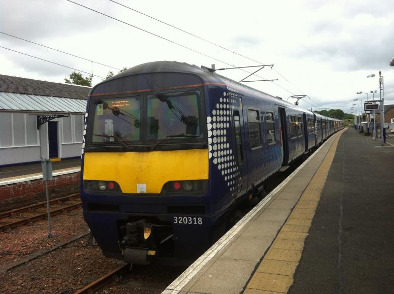 320318 : 320318 and an UID 318 stand at Lanark on 03/07/13. Photo of 320318