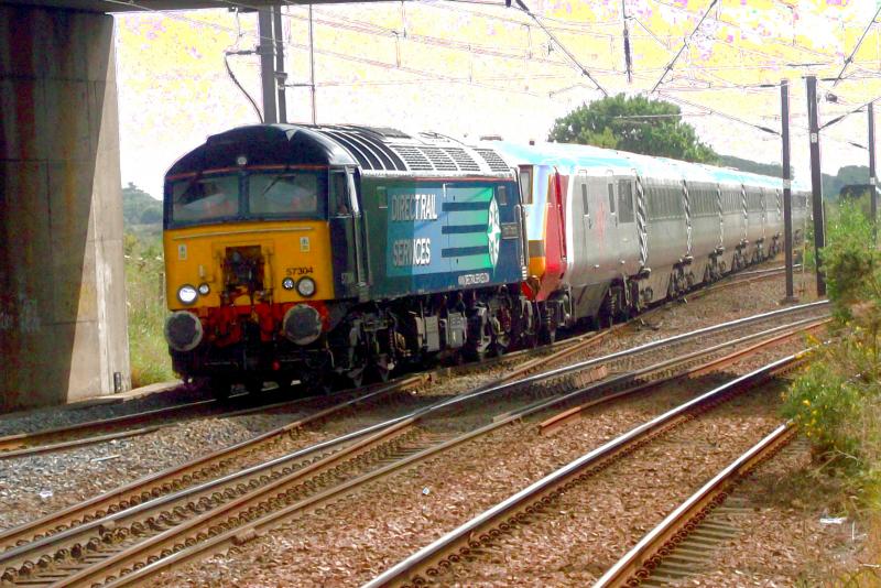 57304 on 5Z41 at Barassie: Having run round in Barassie yard, DRS Thunderbird 57304 leaves for Carlisle and Wembley, on 5Z41 from Kilmarnock to Wembley. with the Prendolino MK3 stock, on Wednesday 10th July 2013. Photo of 57304 on 5Z41 at Barassie
