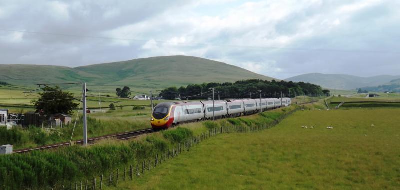 North Bound Express: Pendo heads north on a bright July afternoon in 2013. Photo of North Bound Express