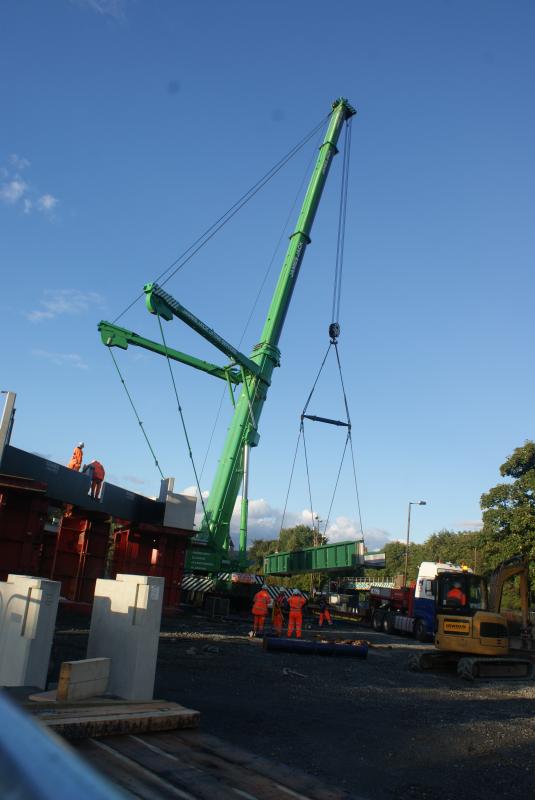 Causewayhead bridge's new southbound deck being lifted: Causewayhead bridge's new southbound deck being lifted of its transporter. 09.09.13 Photo of Causewayhead bridge's new southbound deck being lifted