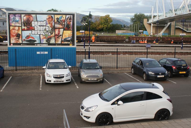 A better view of the GTA billboard but the car choice isn't as great this time: A better view of the GTA billboard but the car choice isn't as great this time. Photo of A better view of the GTA billboard but the car choice isn't as great this time