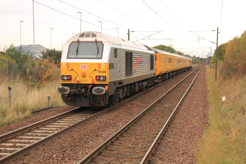 67026 on the rear of 1Q01: 67026 on the rear with 67028 on 1Q01 10.38 Heaton T&R.S.M.D. to Derby R.T.C.(Network Rail) passing through Musselburgh Station on 21/10/2013. Photo of 67026 on the rear of 1Q01