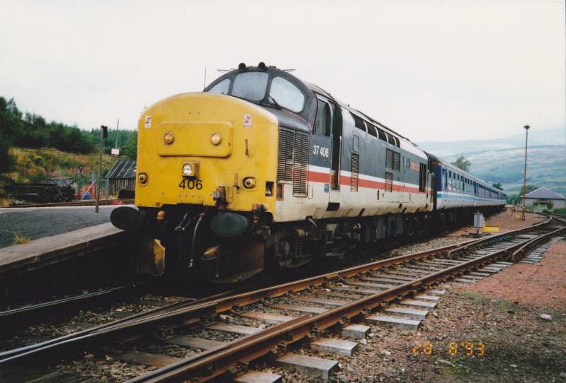 The Young Explorer: 37406 stands at Criannlarich on the 28 August 1993 whilst working the up Young Explorer. Photo of The Young Explorer