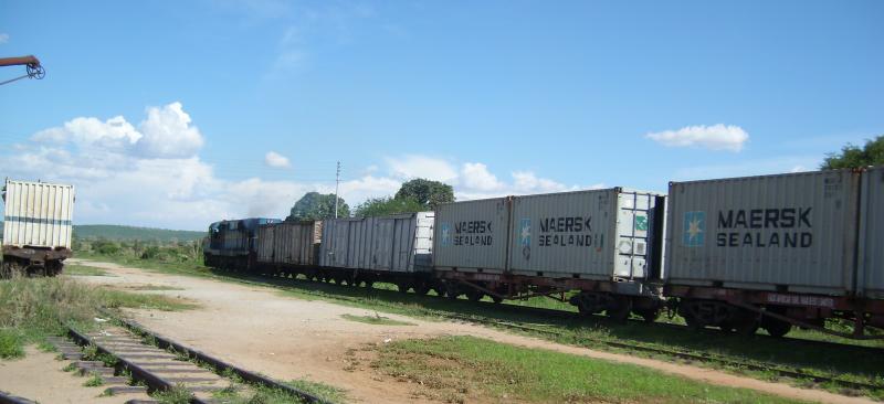 Container Traffic leaves Dodoma: A locomotive hauls containers out of Dodoma (bound for Dar es Salaam), Tanzania on the afternoon of 31st December 2008. Photo of Container Traffic leaves Dodoma