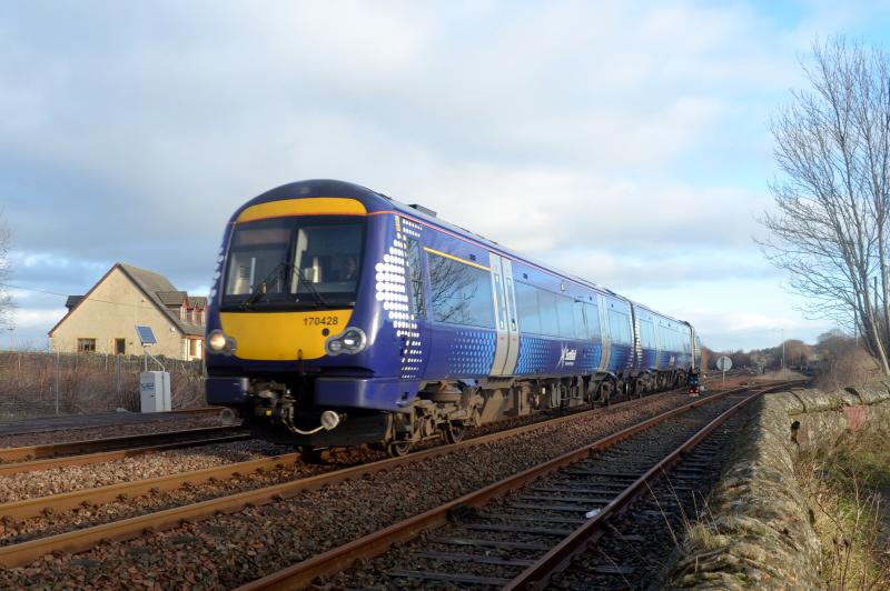 170428 : 170428 makes it's way over the crossover at Greenhill Upper Junction on 26th December 2013 with a Croy to Croy move. Photo of 170428