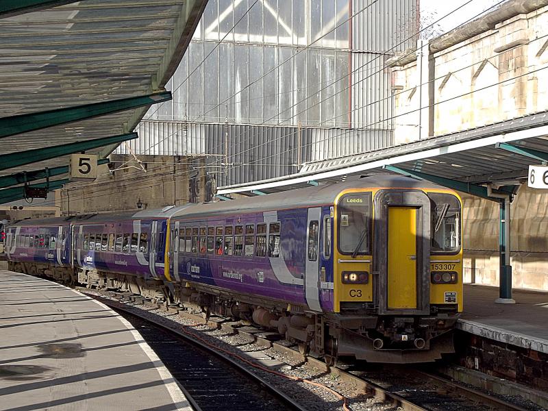 153307 at Carlisle: Passenger numbers are so good on weekends, that trains on the Settle and Carlilse line need to be strengthened. Here 153307 leads 158855 with a service from Carlisle to Leeds on Saturday 28th December 2013. Photo of 153307 at Carlisle