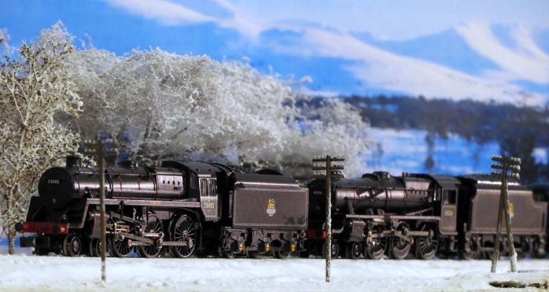 Black 5 and BR Standard Class 5 in the Highlands: Newly acquired BR Standard Class 5 poses for the camera in this lovely winter scene up in the Highlands. Photo of Black 5 and BR Standard Class 5 in the Highlands