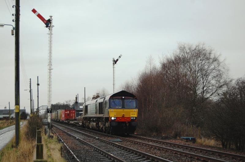 66432 Errol: With all signals off & 1T22 bearing down behind me, 66432 hurries through Errol with 4A13 Grangemouth - Aberdeen. 17/2/2014 Photo of 66432 Errol