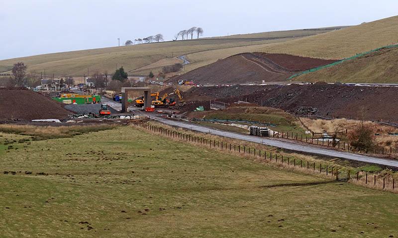 Heriot - 23rd February 2014: Work currently in progress on 23rd February 2014 to construct a new access road into the village at Heriot, the now familiar box bridging the line at this point. Photo of Heriot - 23rd February 2014