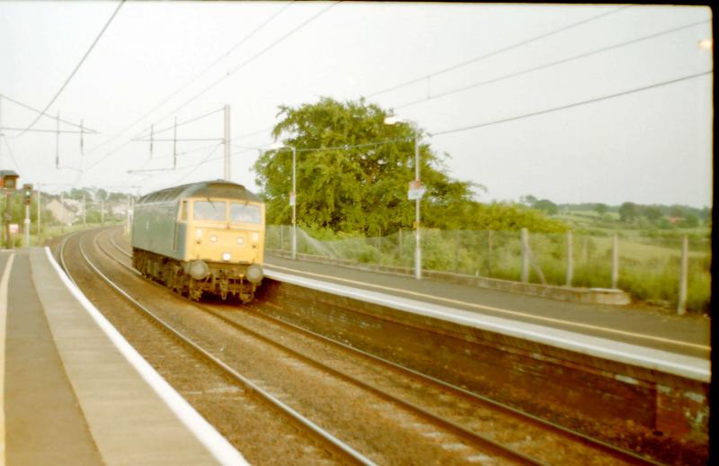 CARLUKE: UNKNOWN CLASS 47 HEADING TOWARDS LAW JN DATE UNKOWN.
POOR QUALITY SCAN. Photo of CARLUKE