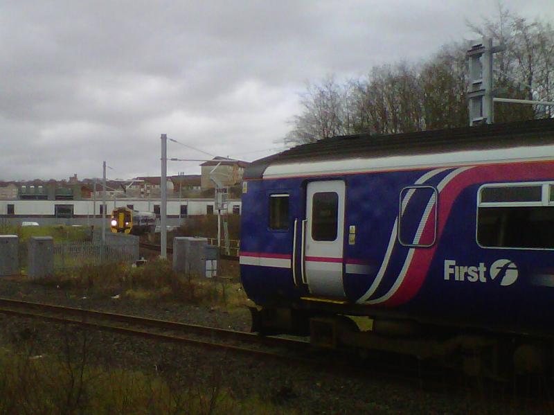 Snarl up at Cowlairs 19 March 2014: Shot taken from Class 170 ex Waverley 11.30 with Class 156 and recently arrived Class 158 all waiting path to Queen Street but held up due to Photo of Snarl up at Cowlairs 19 March 2014