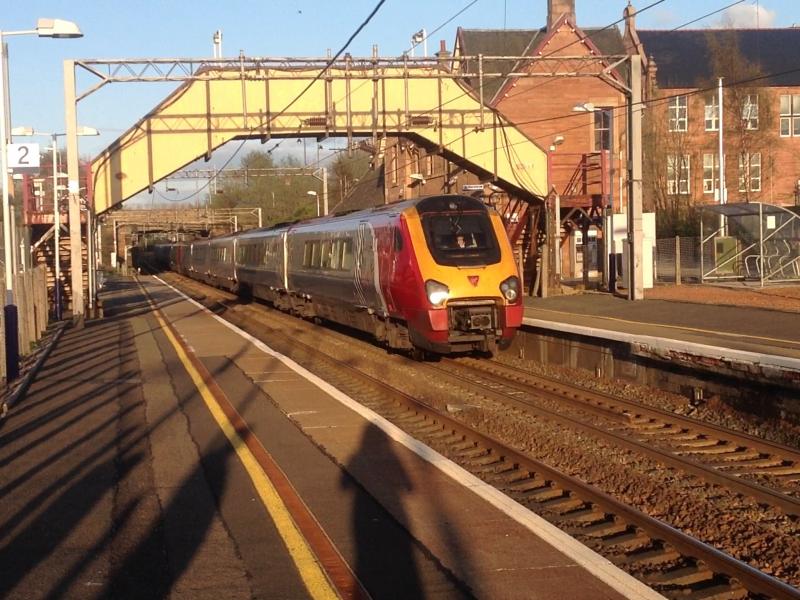 Sunset Voyage: A pair of Virgin Super Voyagers pass Uddingston in the late night sun for Glasgow Central. Photo of Sunset Voyage