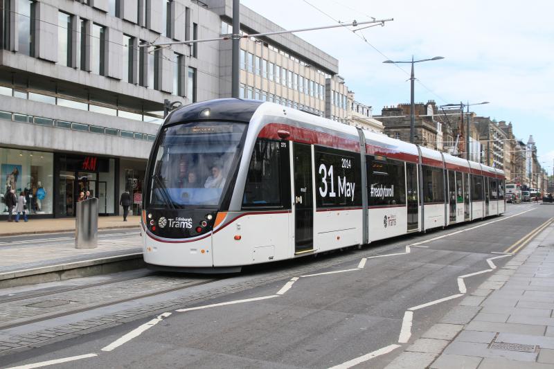 31st of May: Tram 275 advertising the start date of Edinburgh trams on 02/05/2014 in Princes Street. Photo of 31st of May
