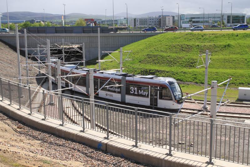 Tram 275: Tram 275 entering the underpass at the site of the Edinburgh Gateway station on 09/05/2014 before construction. Photo of Tram 275