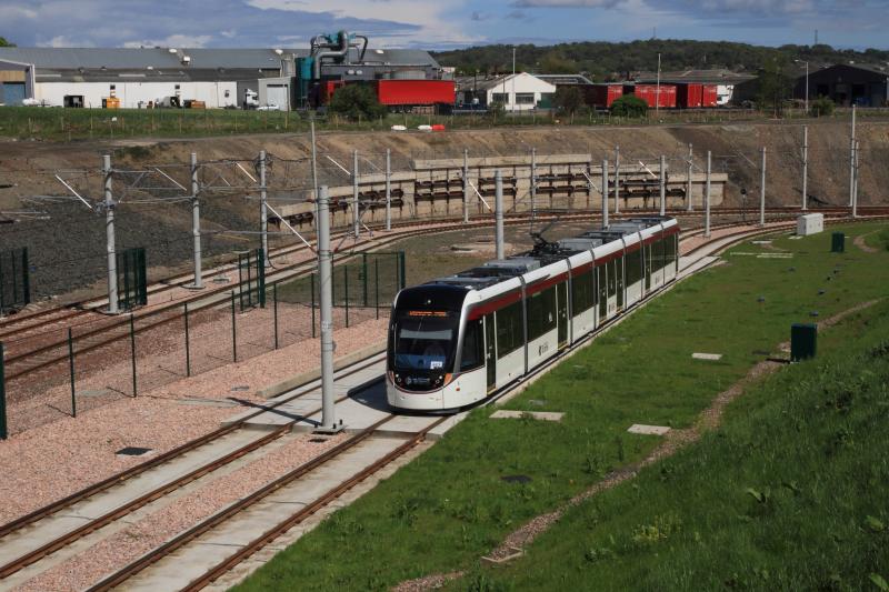 Tram 261: Tram 261 passing the the site of the Edinburgh Gateway station on 09/05/2014 before construction. Photo of Tram 261