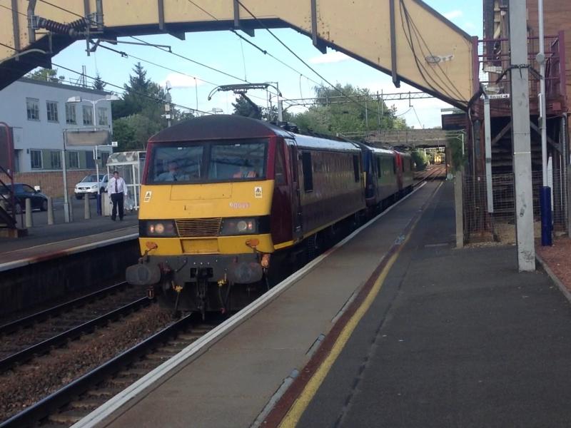 Triple 90: EWS liveried 90020 leading FSR 90021 and DB red 90029 through Uddingston Photo of Triple 90