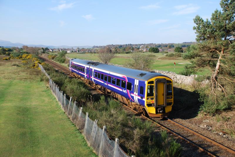 Out late at the golf club: 158723 accelerates away from Muir of Ord with the late running 12.37 Wick to Inverness. 12th April 2007 Photo of Out late at the golf club