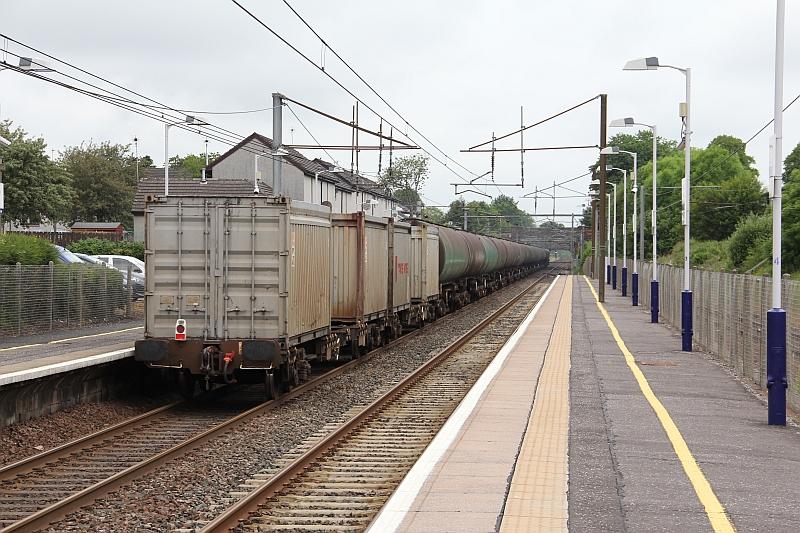 Containers on rear of Dalston- Grangemouth oil at Lockerbie: Containers on rear of Dalston- Grangemouth oil at Lockerbie 13th June 2014 Photo of Containers on rear of Dalston- Grangemouth oil at Lockerbie