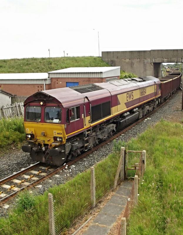 66154: 66154 heads through Barassie on time with the 4S13 Hope Earles Sidings -
New Cummnock MEA emptys. 24th June 2014 Photo of 66154