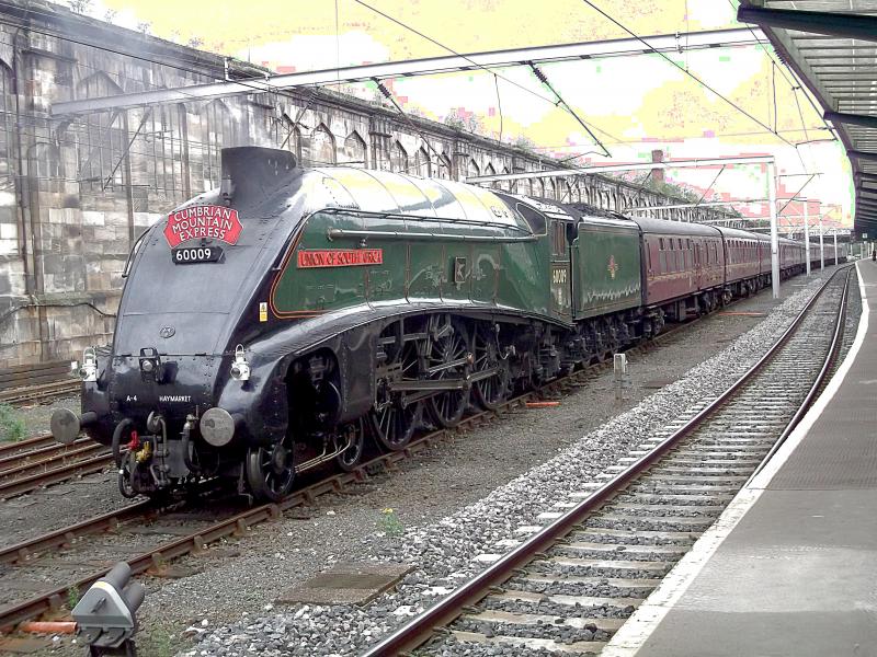 60009 at Carlisle: 60009 Union of South Africa waits at Carlisle with the return stock for the Cumbrian Mountain Express on Saturday 16th August 2014. Photo of 60009 at Carlisle