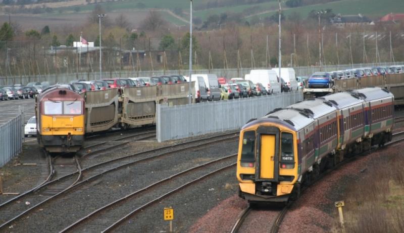 Busy Bathgate: 2 Class 158 units arrive Bathgate from Edinburgh Waverley while a class 60 shunts the Yard with incoming automotive trafic Photo of Busy Bathgate