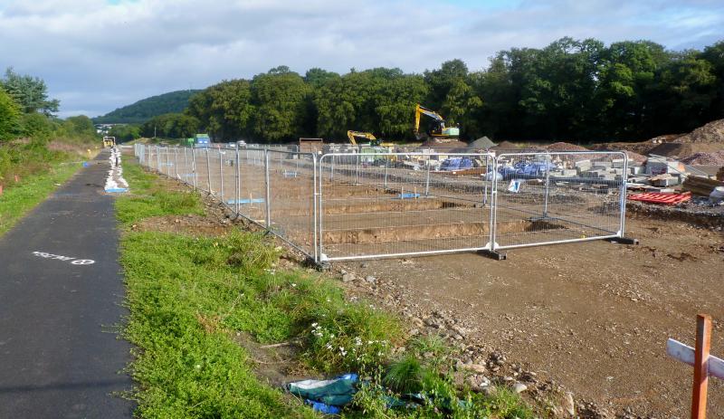 Tweedbank Station 23 August 2014: Tweedbank station under construction in August 2014, the central platform foundations are dug out the old trackbed is to the left where the tarmac path is. Photo of Tweedbank Station 23 August 2014
