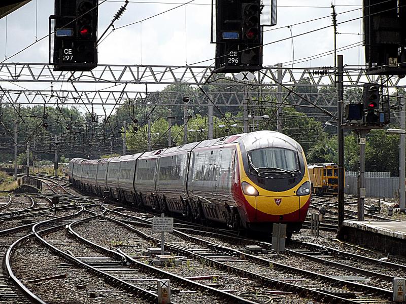 390153 at Carlisle: Car Pendolino 390153 arrives at Carlisle with a service from LOndon Euston via Birmingham to Edinburgh Waverley on Saturday 30th August 2014. Photo of 390153 at Carlisle