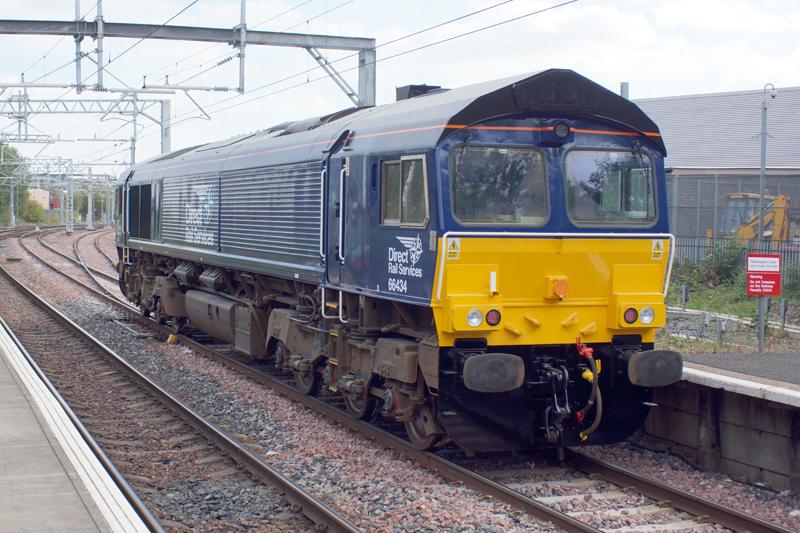 66434: 66434 departing Springburn Station on the 0Z22 1400 Glasgow Works to Kingmoor TMD on 22/09/14
Copyright remains with claas47man no further use or publication without owners permission Photo of 66434