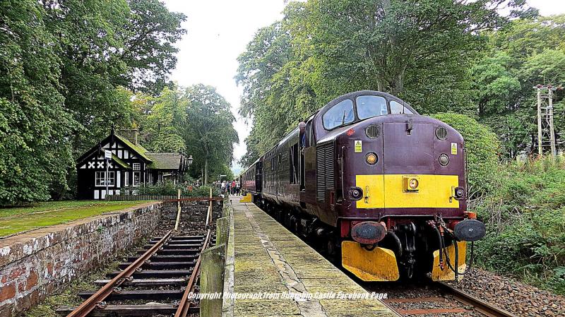 37516 at Dunrobin Castle 23 September 2014: 37516 at Dunrobin Castle 23 September 2014 on the Royal Scotsman. Note the track panel in the former bay platform. Photo of 37516 at Dunrobin Castle 23 September 2014