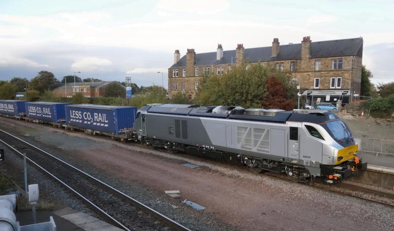 Photo of 68014 passes Larbert with 4D47 for Mossend.
