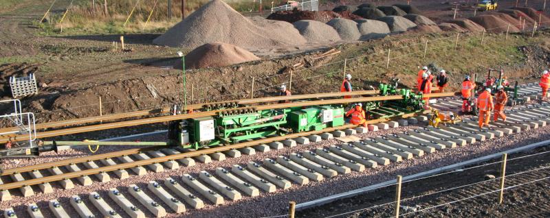 BAM rail laying machine: CWR laying machine just North of Shawfair Station Photo of BAM rail laying machine