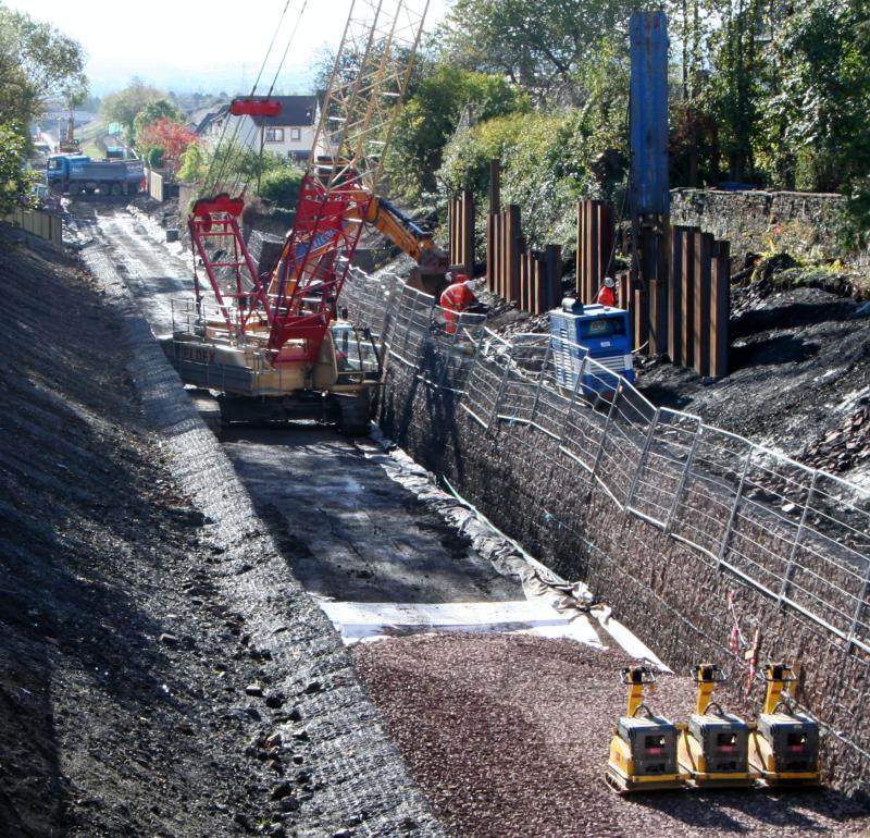 Eskbank looking south 11/10/14: Some last minute piling work being done prior to ballasting and sleeper laying. Photo of Eskbank looking south 11/10/14