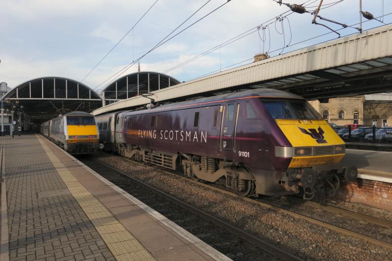 Photo of 91101 passes 91106 at Newcastle 29.10.14