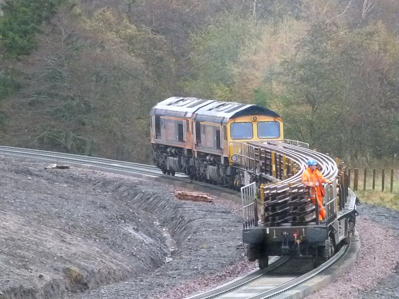 Rail Train at Cowbraehill: GBRF 66736/739 heading for the Scottish Borders at 8.22 on the 7th of November 2014 with the rails for the Falahill section Photo of Rail Train at Cowbraehill