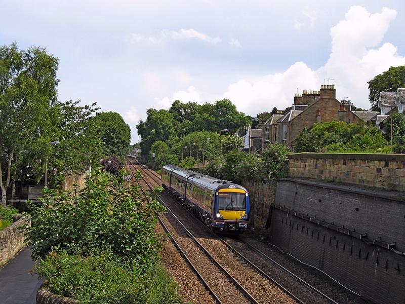 170426 at Linlithgow: On 17/07/2007, 170426 speeds through Linlithgow with
1R91, the 12:30 Edinburgh - Queen St. Photo of 170426 at Linlithgow