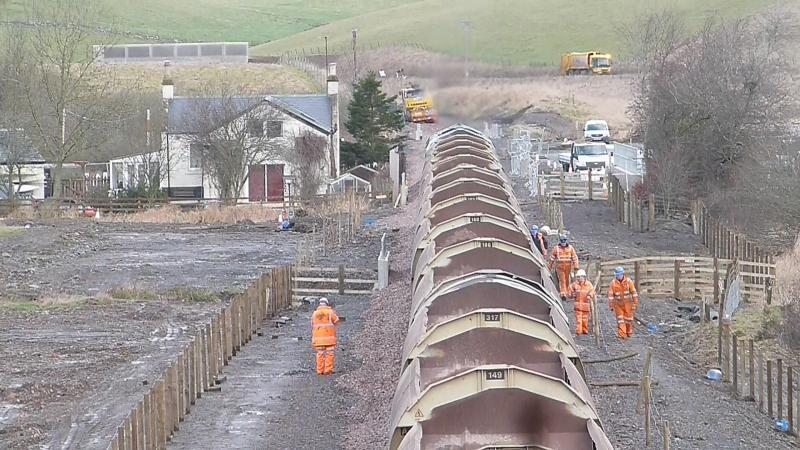 Ballast drop at Heriot Dec 17th 2014: Only 5 of the 30 Autoballasters left to empty past the old Heriot Station. Photo of Ballast drop at Heriot Dec 17th 2014