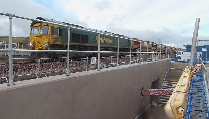 66613 at Heriot.: 66613 leading the 30 Autoballasters over the new underpass at Heriot where the level crossing used to be on the original Waverley Line Photo of 66613 at Heriot.