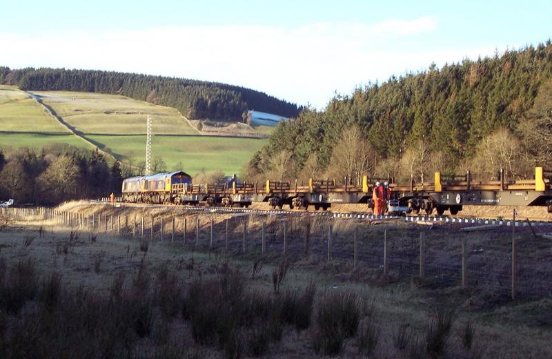 Photo of First train over the new underbridge at Ferniehirst