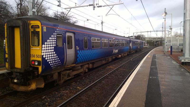 156 503 at Bargeddie: 156 503 sits at Bargeddie station on 13/12/14. This was the last day of DMU's on the Whifflet line, and 156 503 was the last 156 to operate on the line before the switch to EMU's. Photo of 156 503 at Bargeddie
