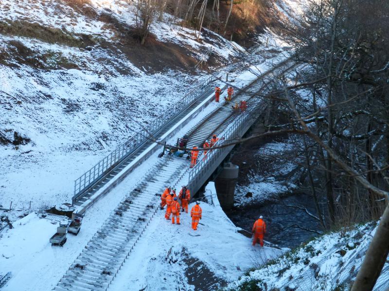 Bridge at Torwoodlee: Rail laying train waiting round the corner at Torwoodlee on the 30th of January 2015. Photo of Bridge at Torwoodlee