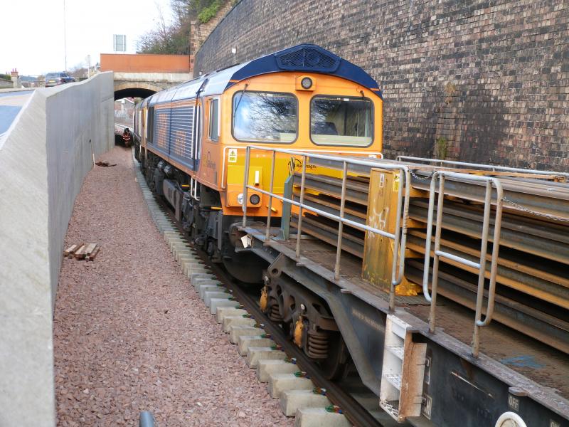 Locos now through the tunnel.: Locos now through the short tunnel carrying the A7 road &
photographed against the high brick retaining wall which extends all the way to the new Station. Photo of Locos now through the tunnel.
