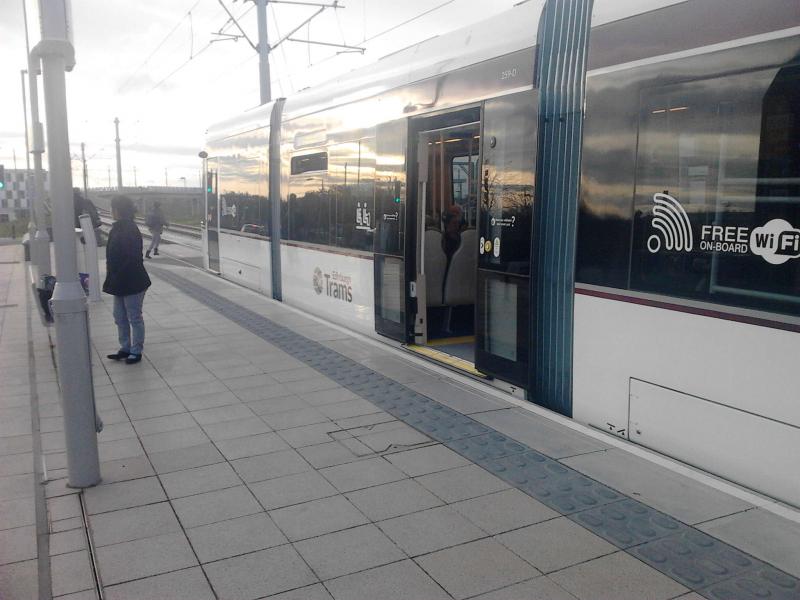 At Edinburgh Park: Commuters leaving an Airport bound tram at Edinburgh Park in October 2014. Photo of At Edinburgh Park