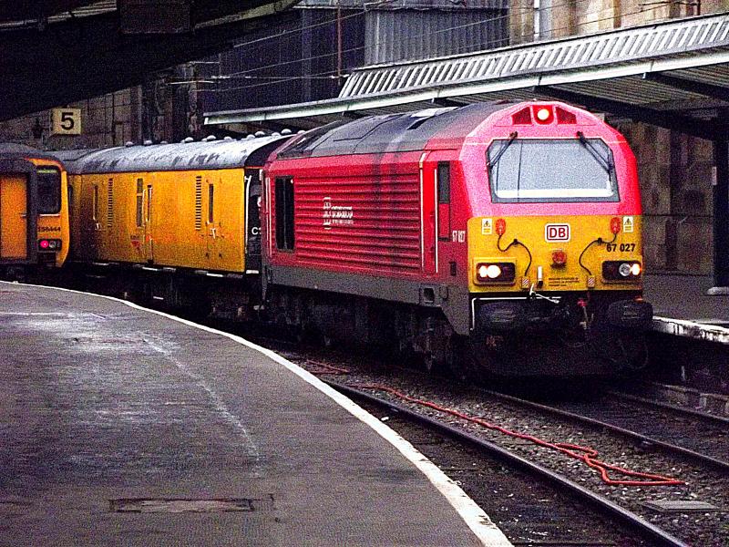 67027 at Carlsile: DB Shenker liveried 67027 heads a test train from Derby to Heaton, at Carlisle on Saturday 7th February 2015. Photo of 67027 at Carlsile