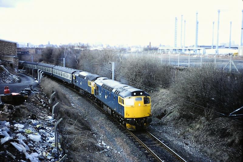 27011 + 27021: On the Terminus Curve at Muirhouse, with ECS from Bellahouston for King's Park to Aberdeen footex, following the Scottish League Cup Final, 31 March 1979 Photo of 27011 + 27021