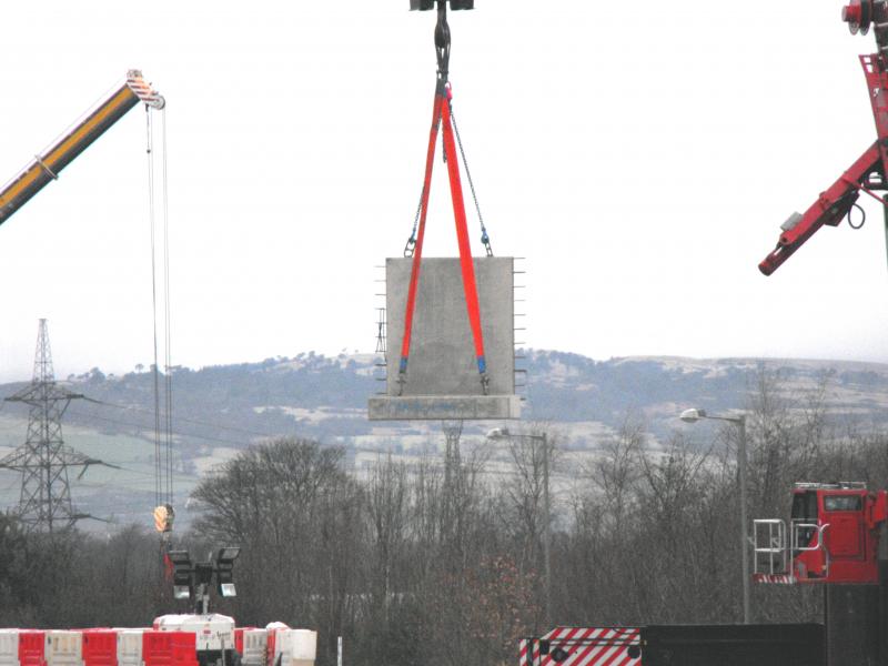 L shape concrete block in mid air: Photo of L shape concrete block in mid air