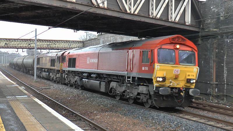 Dalston - Mossend oil tanks at Carstairs: DBS class 66s, 66114 and 66086 (DIT) head north through Carstairs with 6S36 from Dalston to Mossend. Taken on 11 February 2015 Photo of Dalston - Mossend oil tanks at Carstairs
