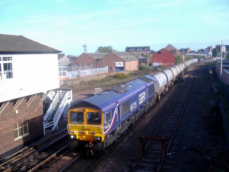 66 729: 66 729 heads North thro' Arbroath with the Doncaster-Aberdeen 'Mud oil tanks. Photo of 66 729