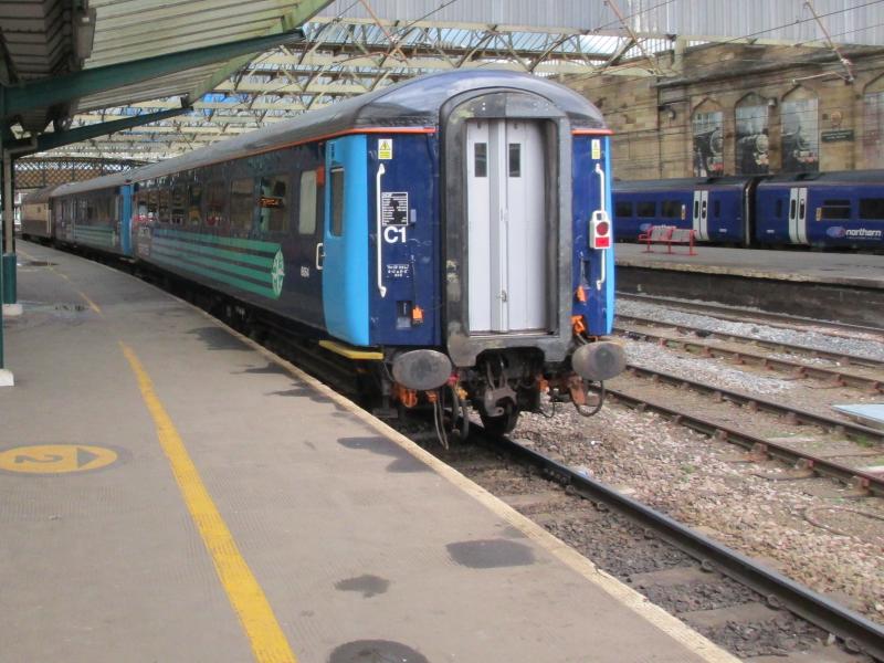 Rear view of refurbished DRS coaches: Rear view of 2 DRS refurbished coaches hauled by Class 57 #57312 at Carlisle 26.3.15 on 5Z57 Photo of Rear view of refurbished DRS coaches