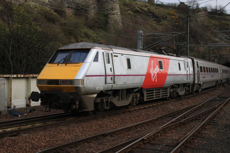 Virgin logo Class 91: 91106 with 82206 also with logo on 1E10 the 10.00 Edinburgh to London Kings Cross approaching Calton Tunnel North on 30/03/2015 Photo of Virgin logo Class 91