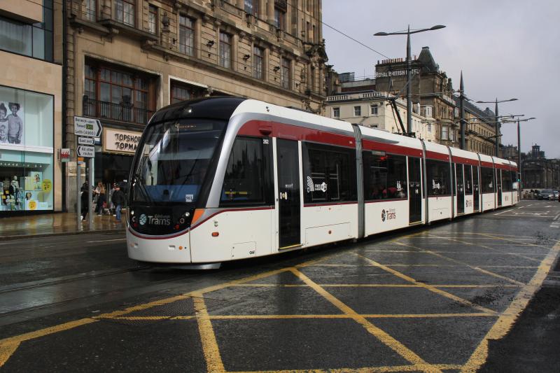 Red Tram 262 no more: Tram 262 passing the junction of Waverley Bridge & Princes St after being repainted to match the rest of the fleet on 03/04/2015 Photo of Red Tram 262 no more